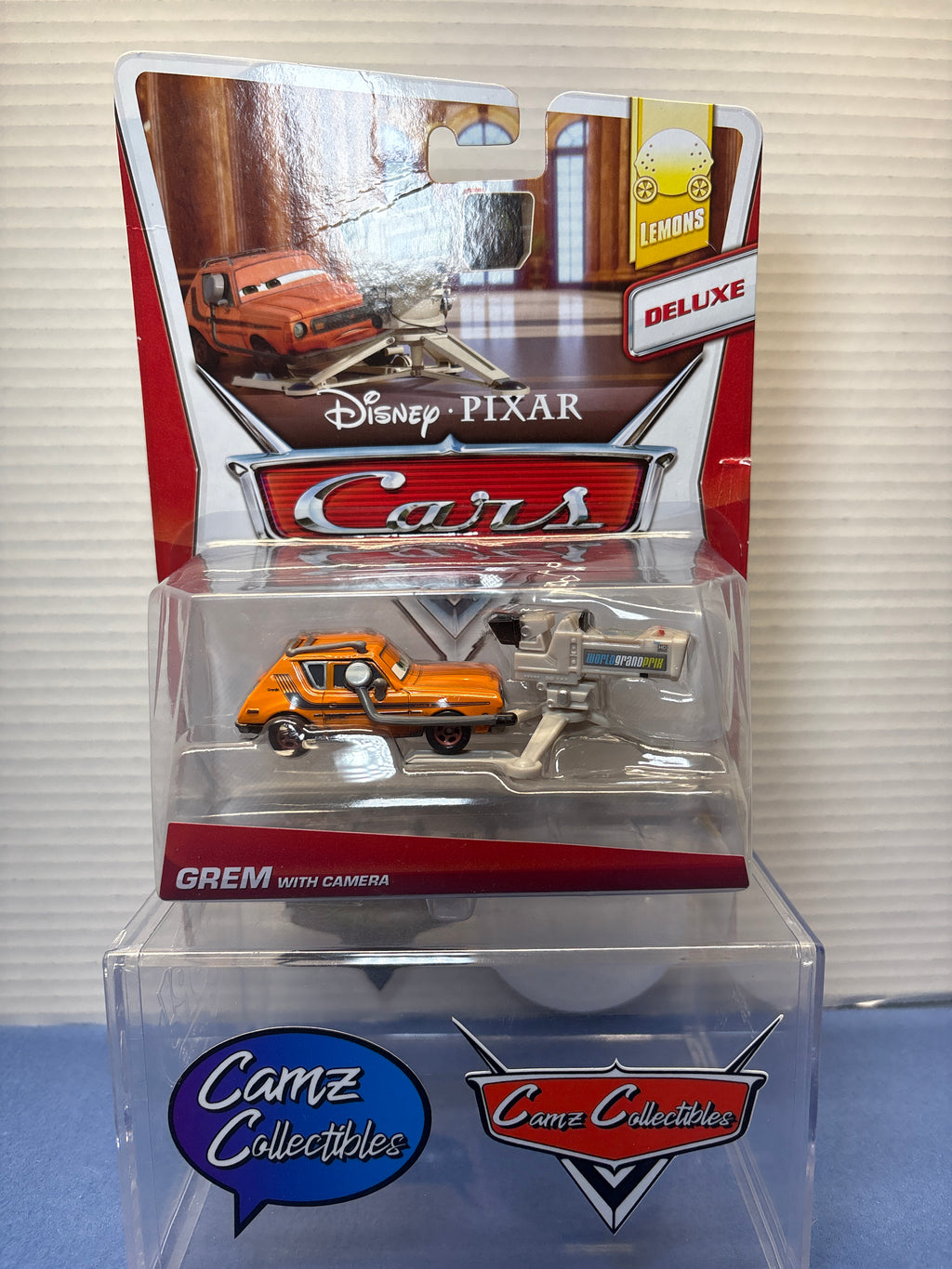 Disney Pixar Cars Lemons Deluxe Grem with Camera - cut on right of card