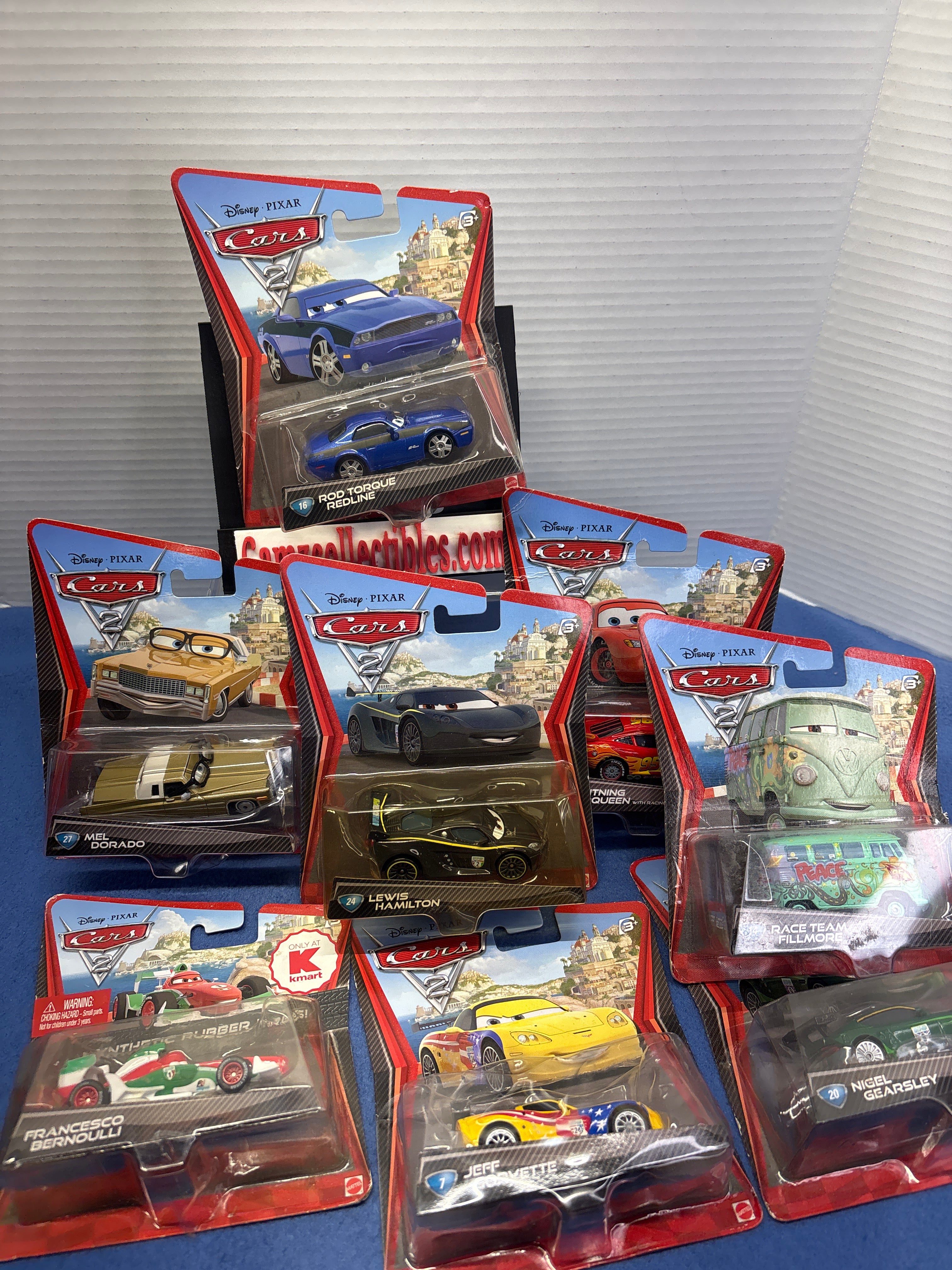 Disney Pixar Cars 2 Bundle of 8 - Rod Torque Redline,  Lightning McQueen, Mel Dorado, Race Team Fillmore, Nigel Gearsley, Jeff Gorvette, Francesco Bernoulli, Lewis Hamilton
