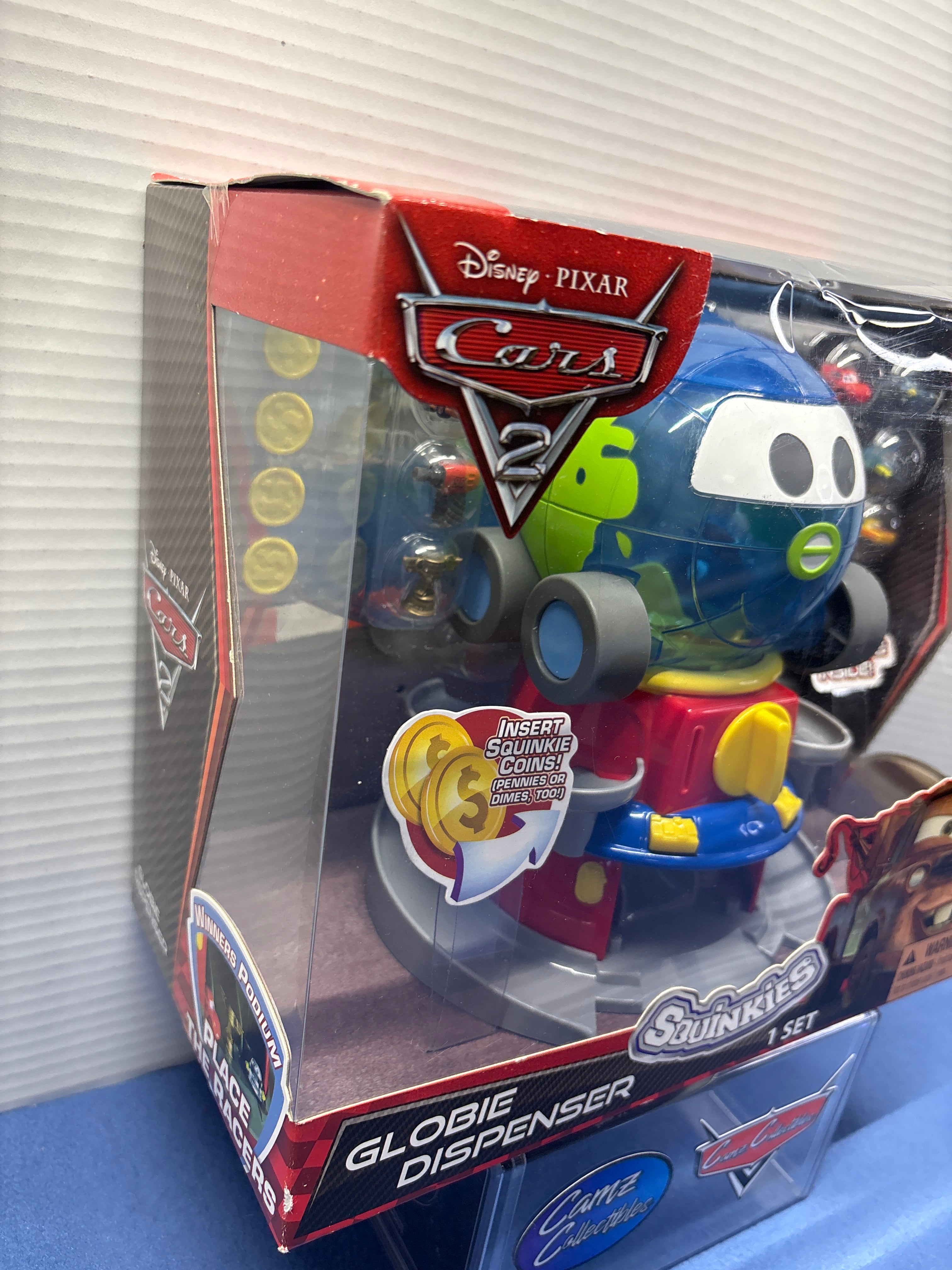 Disney Pixar Cars 2 Globie Dispenser Sealed with squinkies and coins