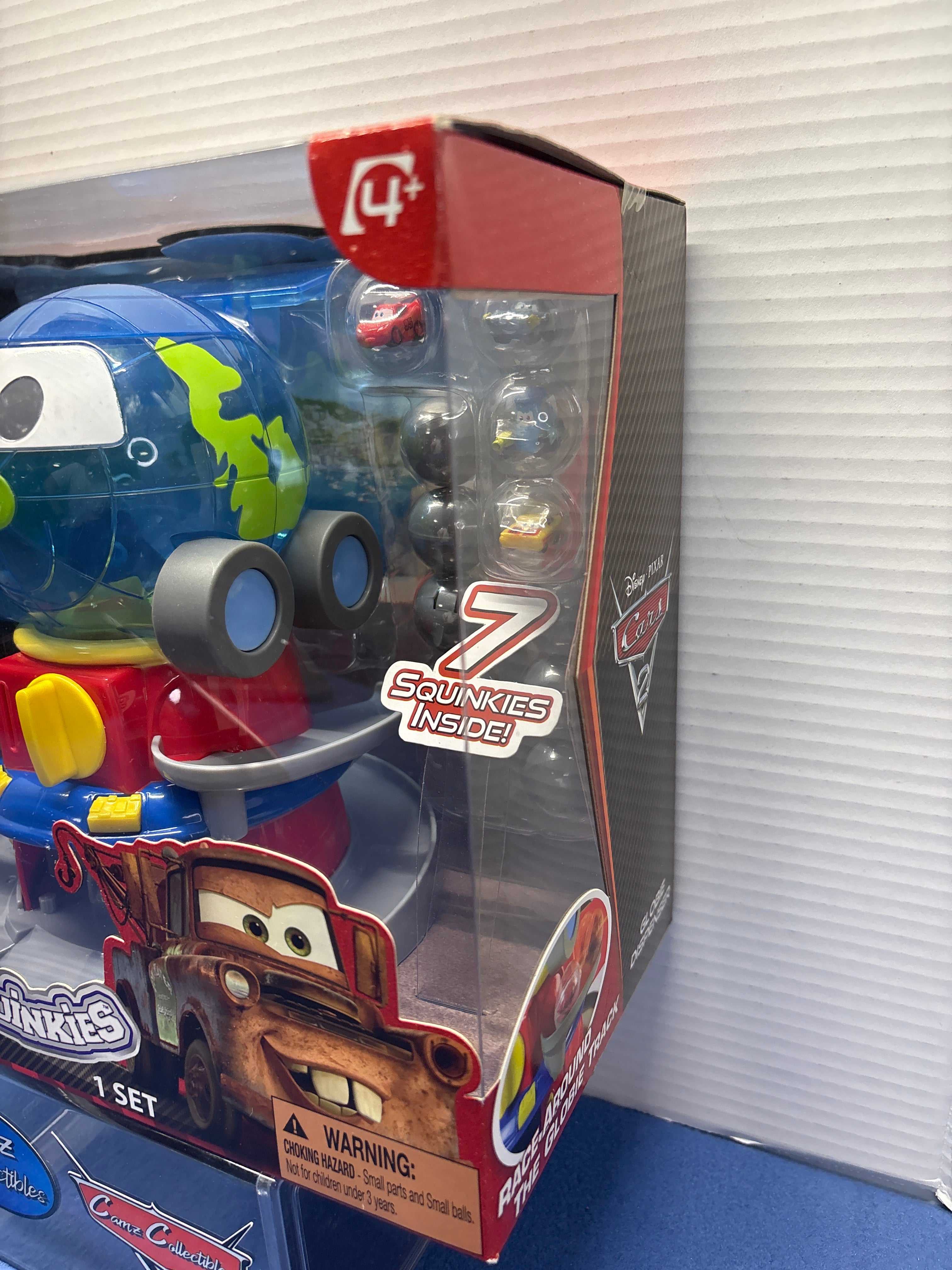 Disney Pixar Cars 2 Globie Dispenser Sealed with squinkies and coins