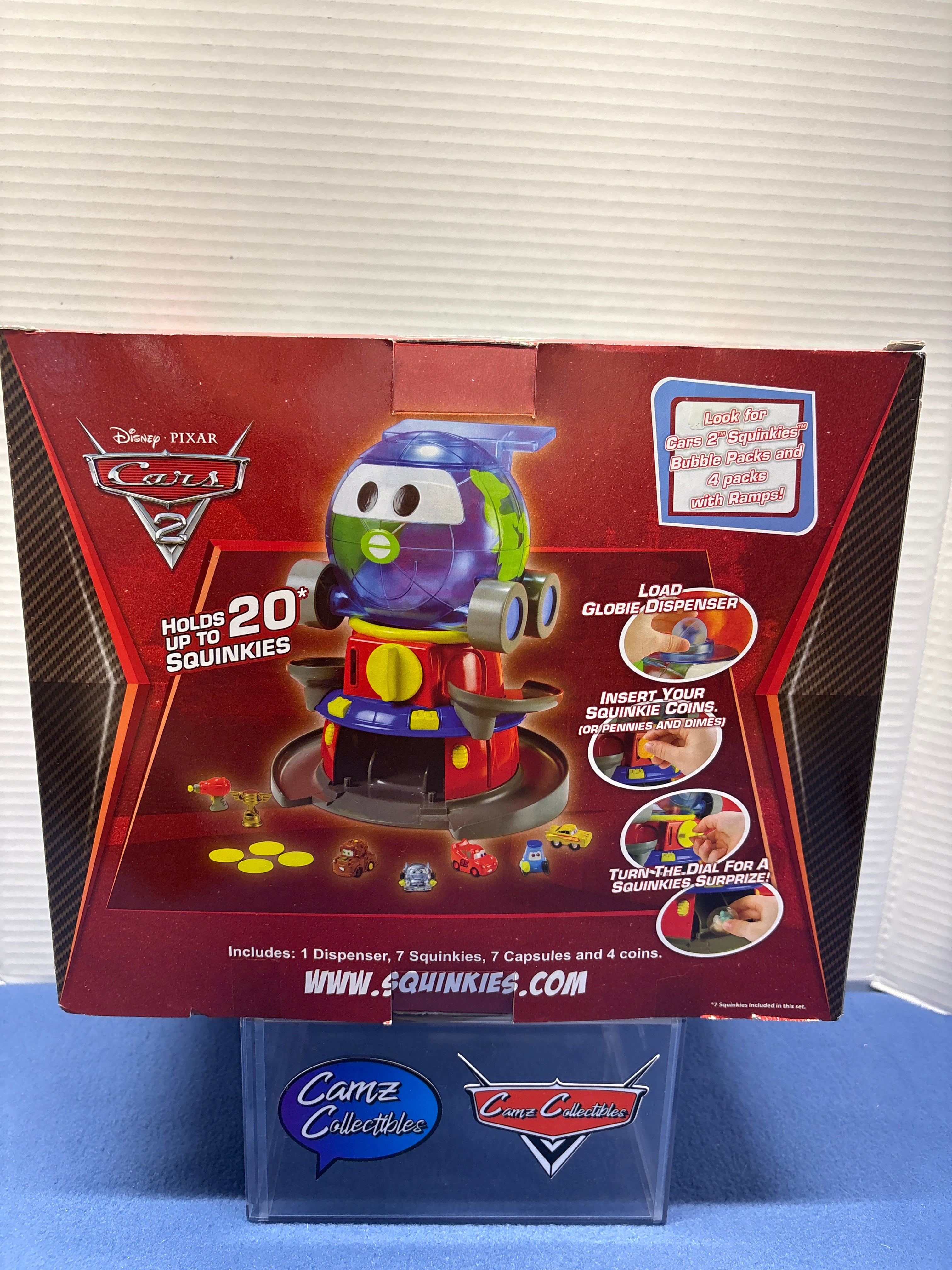 Disney Pixar Cars 2 Globie Dispenser Sealed with squinkies and coins