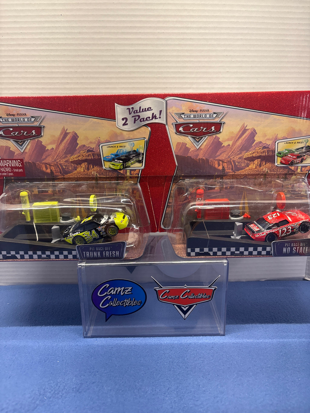 Disney Pixar Cars World of Cars Value 2 Pack Pit Race Off Trunk Fresh and Pit Race Off No Stall