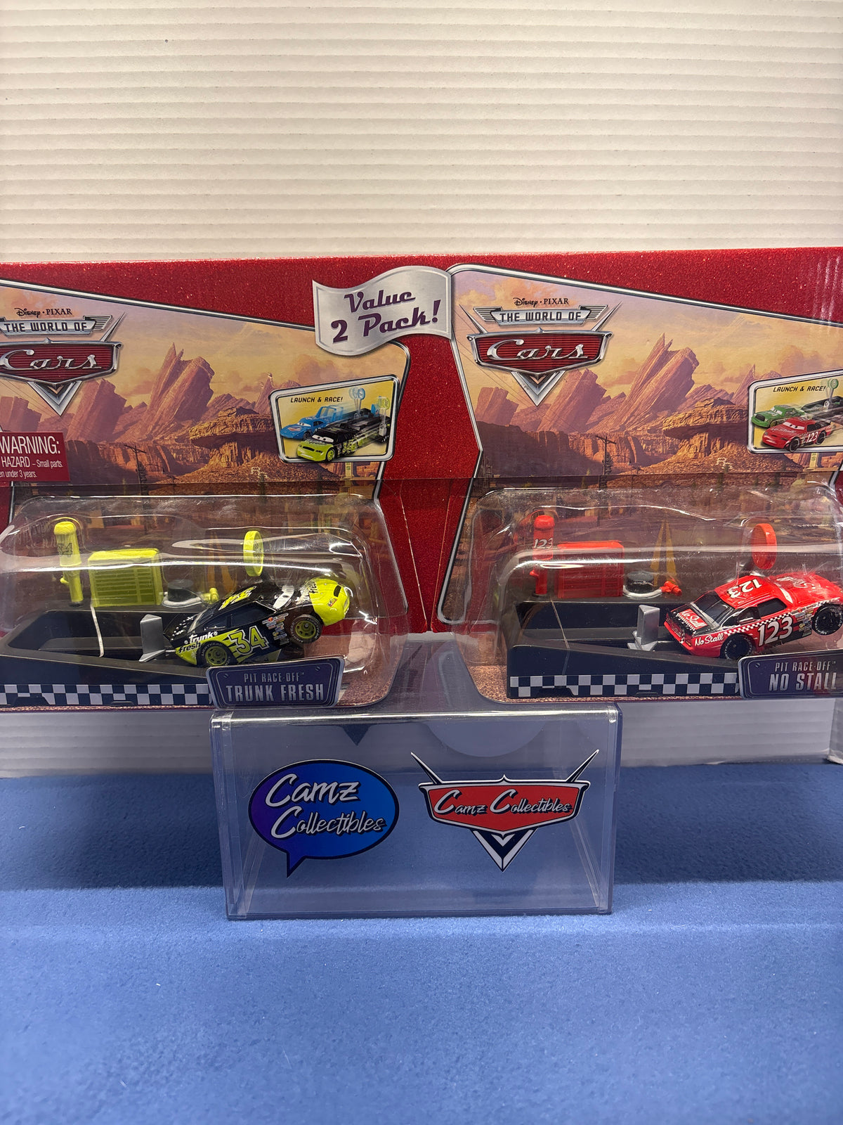 Disney Pixar Cars World of Cars Value 2 Pack Pit Race Off Trunk Fresh and Pit Race Off No Stall