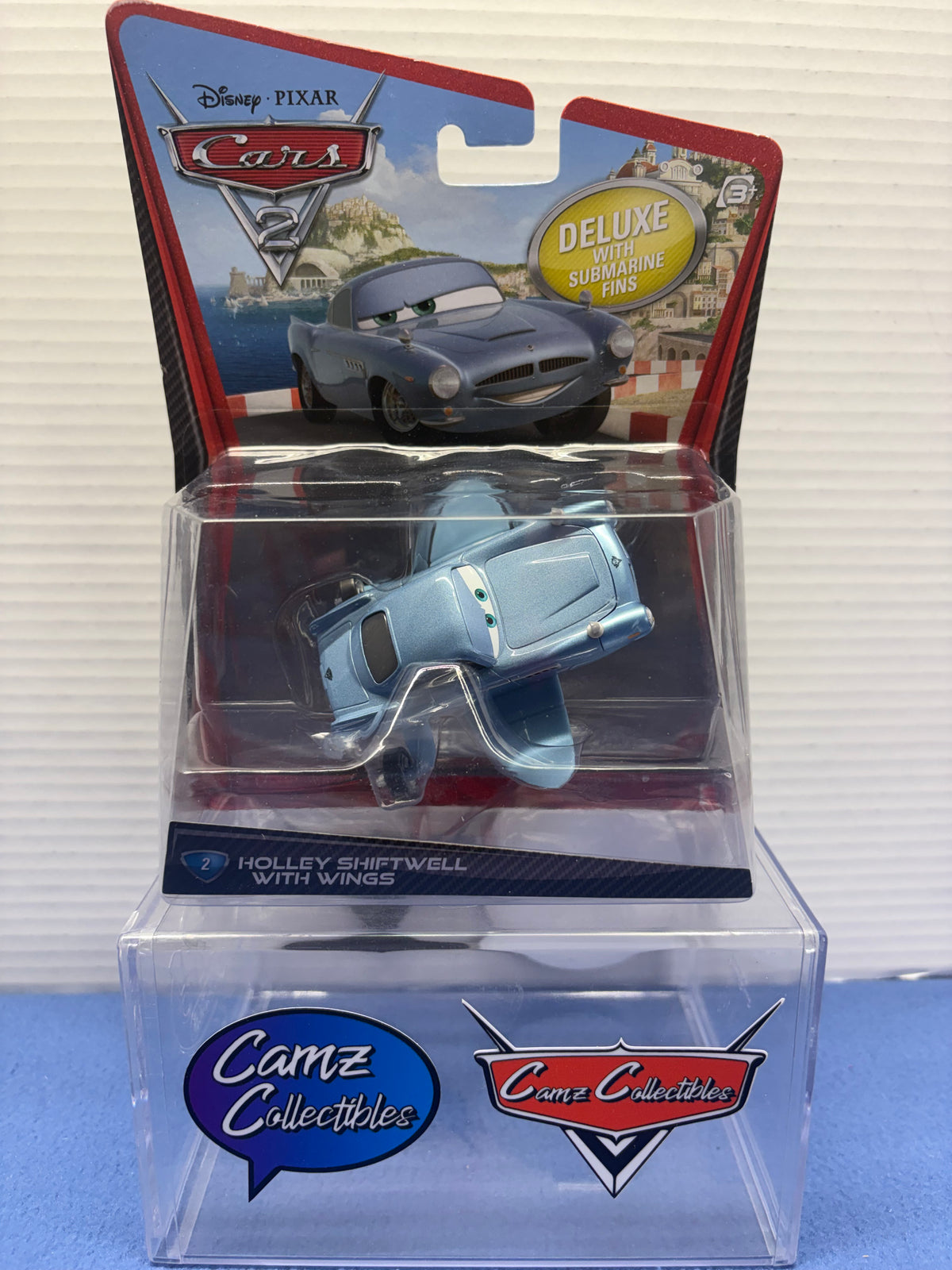 Disney Pixar Cars 2 Deluxe Finn with Submarine Fins (Error Card Holley Shiftwell with Wings)