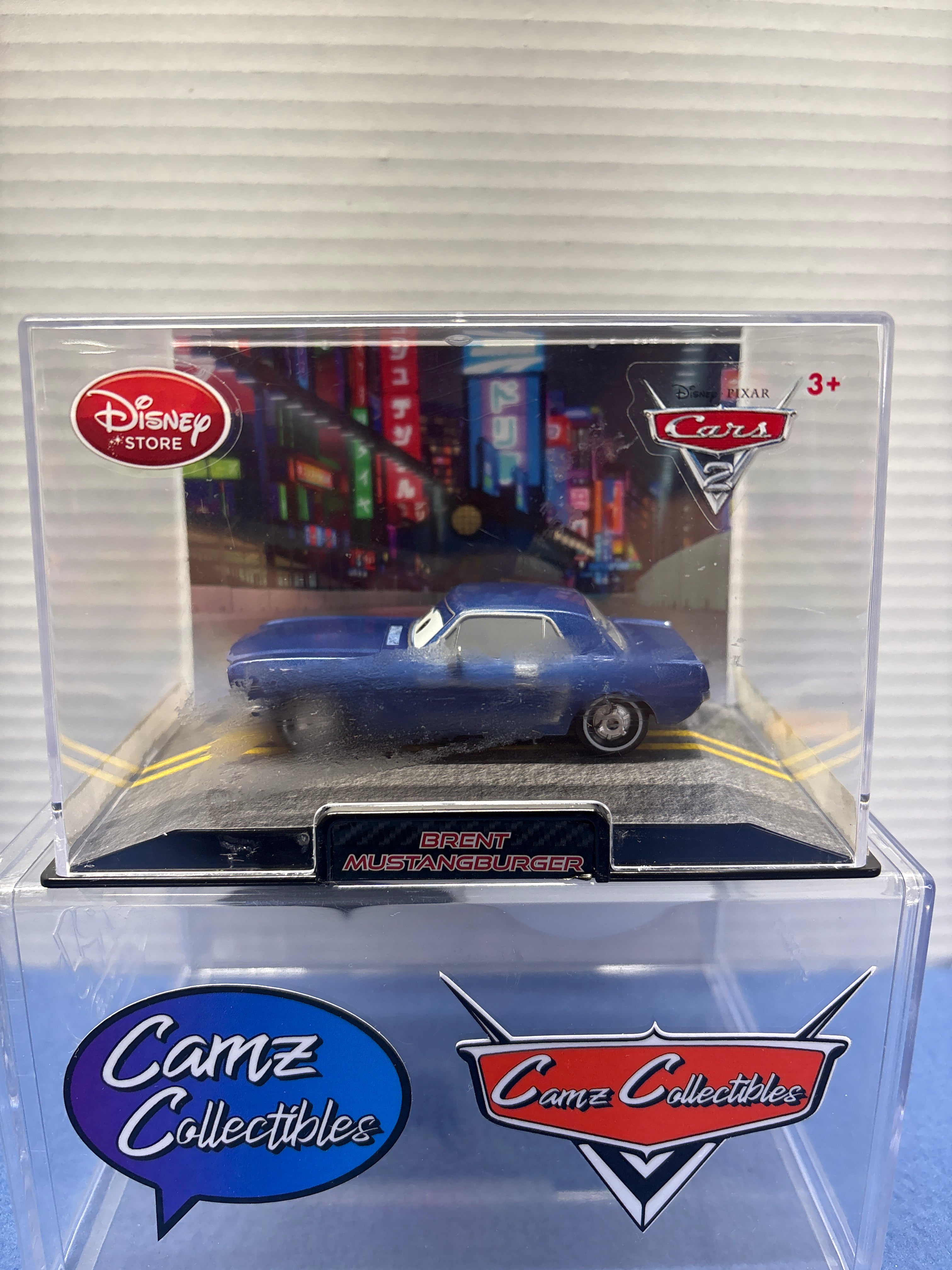 Disney Pixar Cars 2 Disney Store Diecast 1:43 Brent Mustangburger (sticker residue)