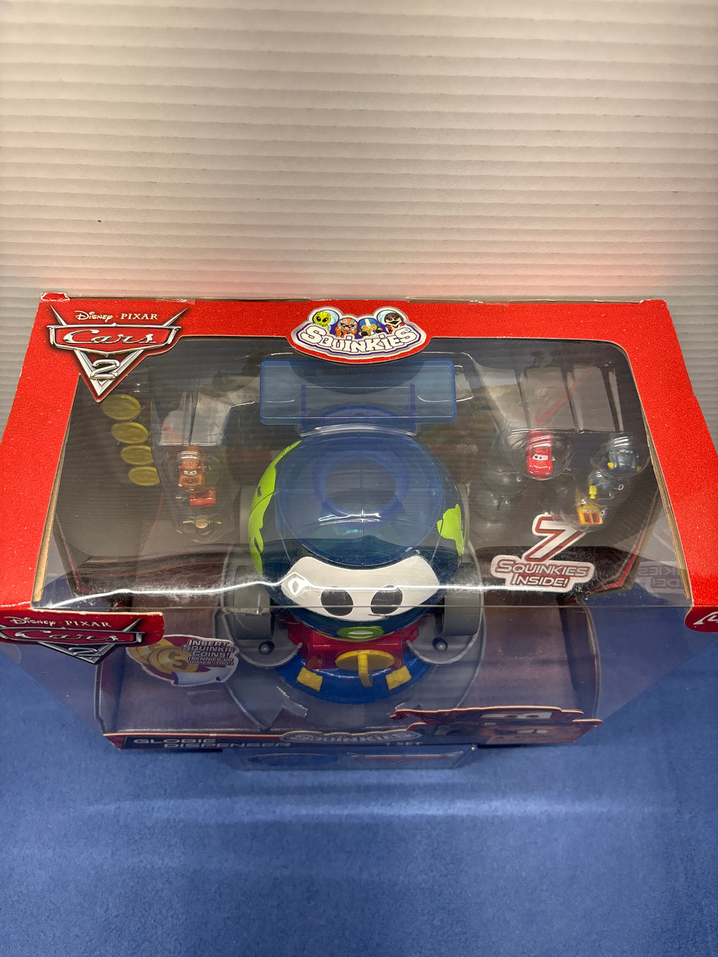 Disney Pixar Cars 2 Globie Dispenser Sealed with squinkies and coins