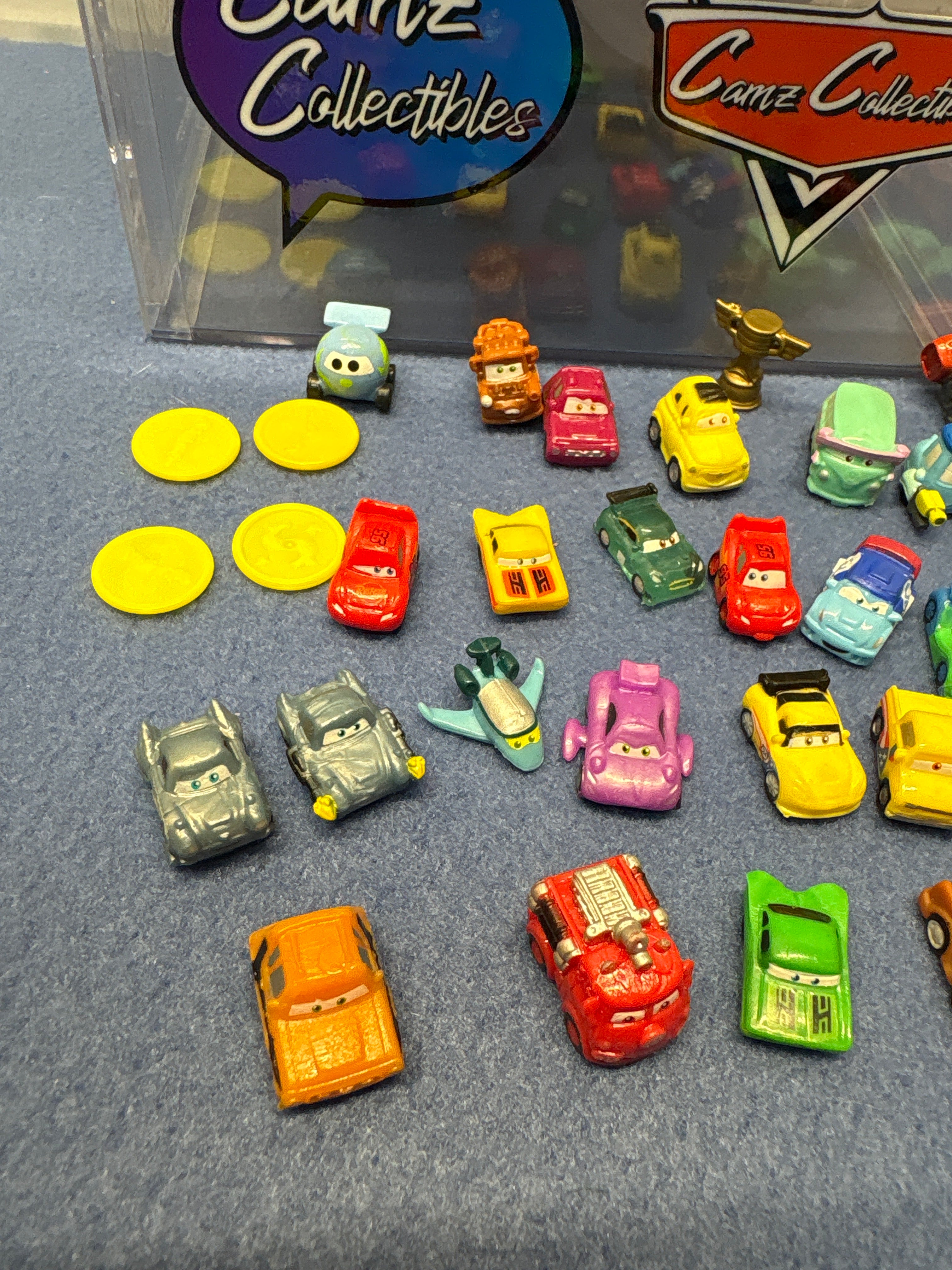 Disney Pixar Cars 2 Loose Globie Dispenser with squinkie coins and 24 squinkies