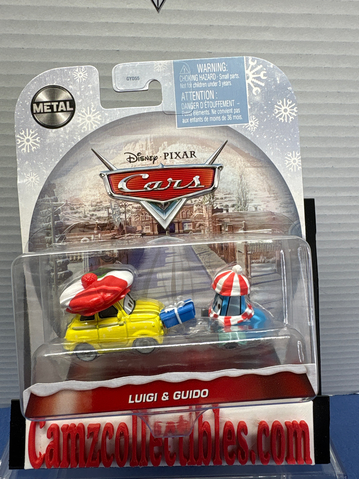 Disney Pixar Cars Christmas Luigi & Guido (note loose present in package) sealed