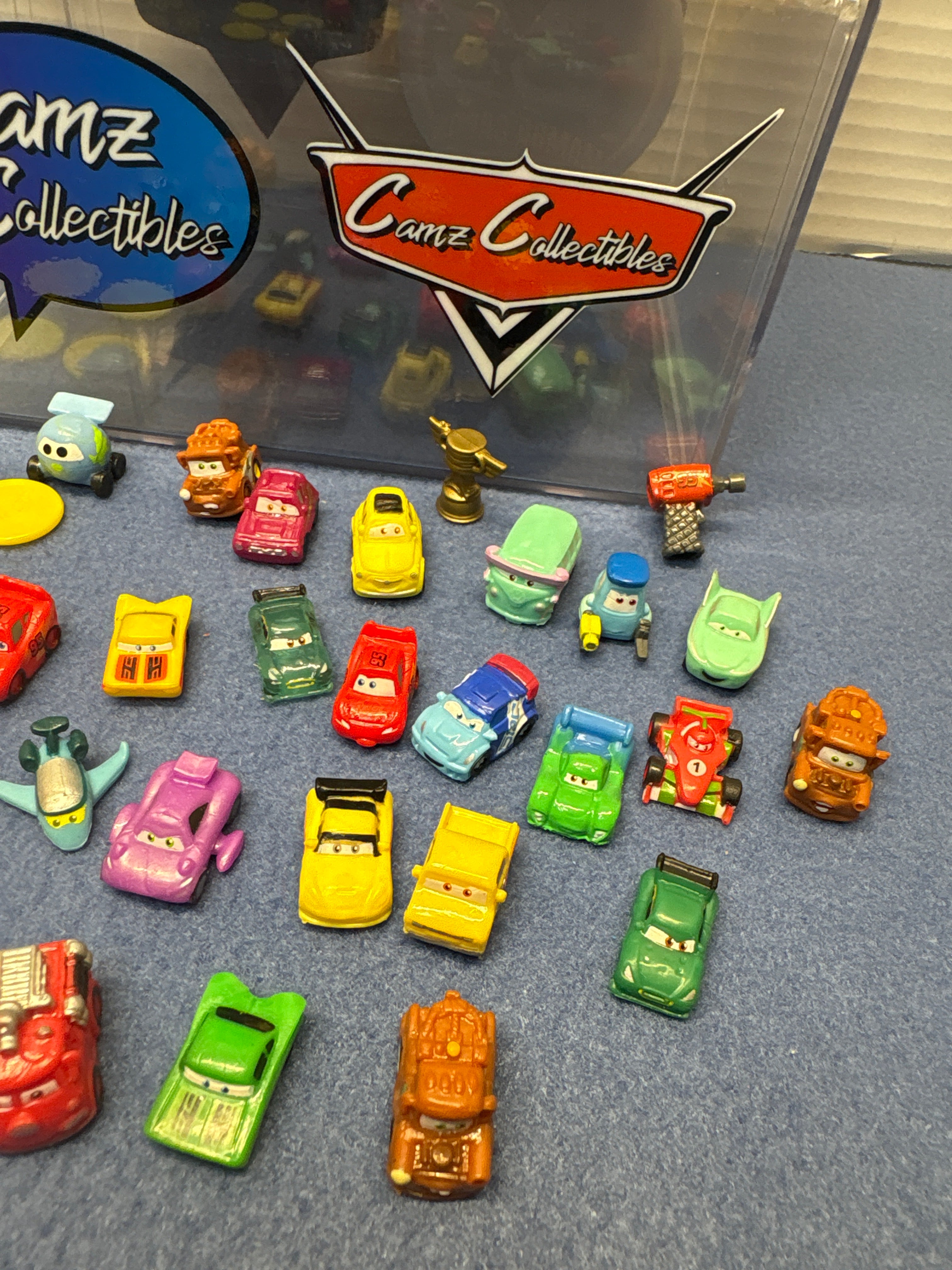 Disney Pixar Cars 2 Loose Globie Dispenser with squinkie coins and 24 squinkies