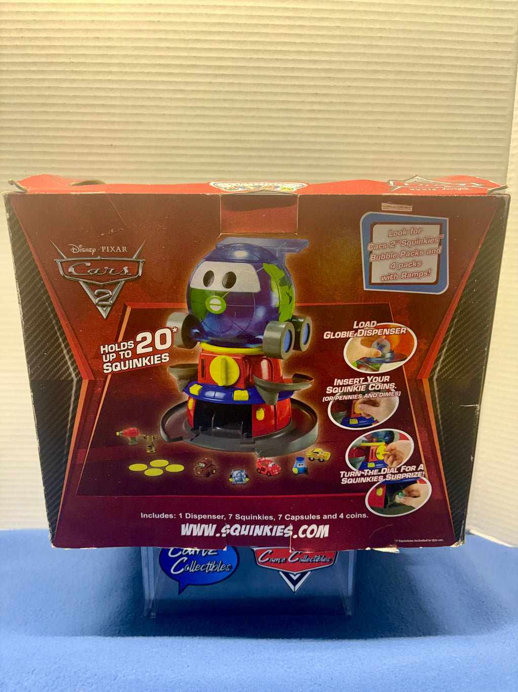 Disney Pixar Cars 2 Globie Dispenser Sealed with squinkies and coins