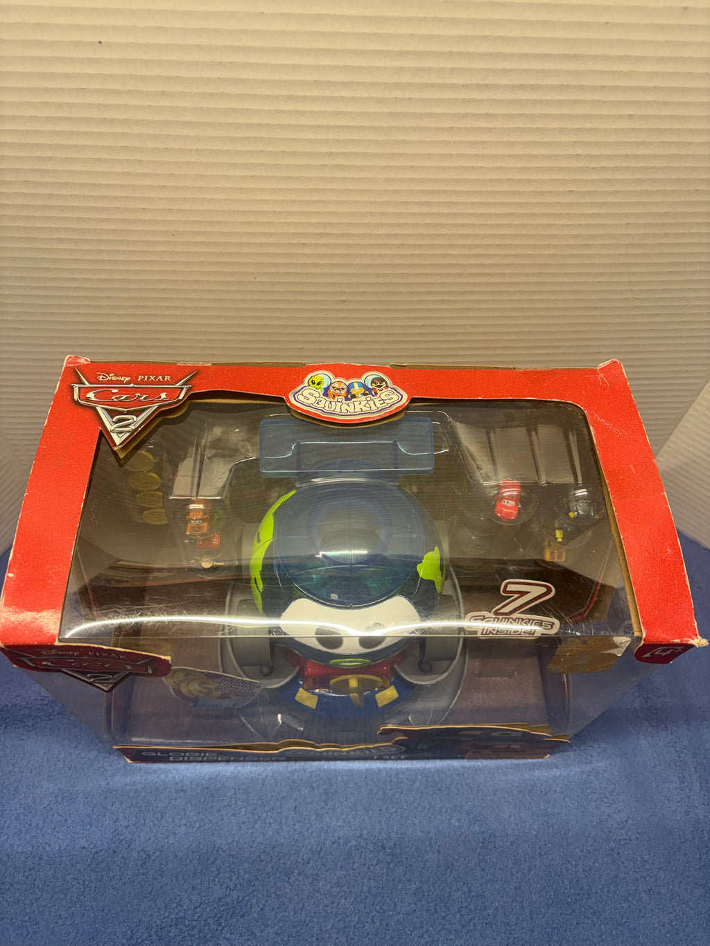 Disney Pixar Cars 2 Globie Dispenser Sealed with squinkies and coins