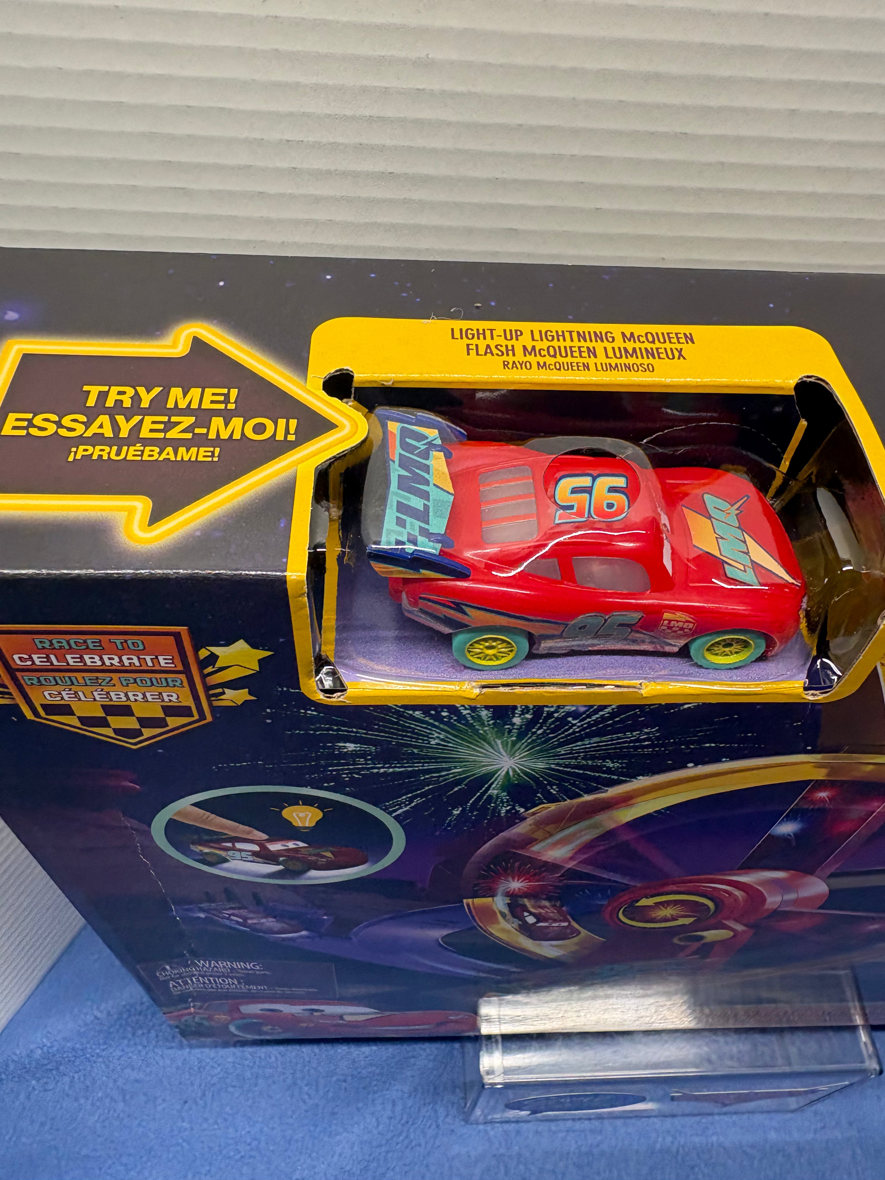Disney Pixar Cars Race to Celebrate Lightning McQueen Celebration Raceway incudes Light Up McQueen
