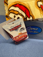 Cars 20th Anniversary 2006–2026 hangtag on holiday pajama pants