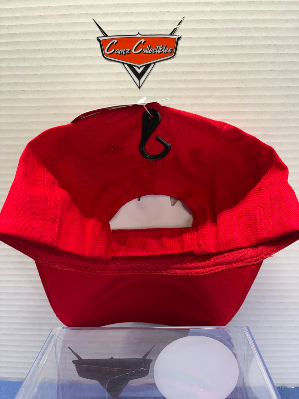 Rear view of red Lightning McQueen kids hat with adjustable strap