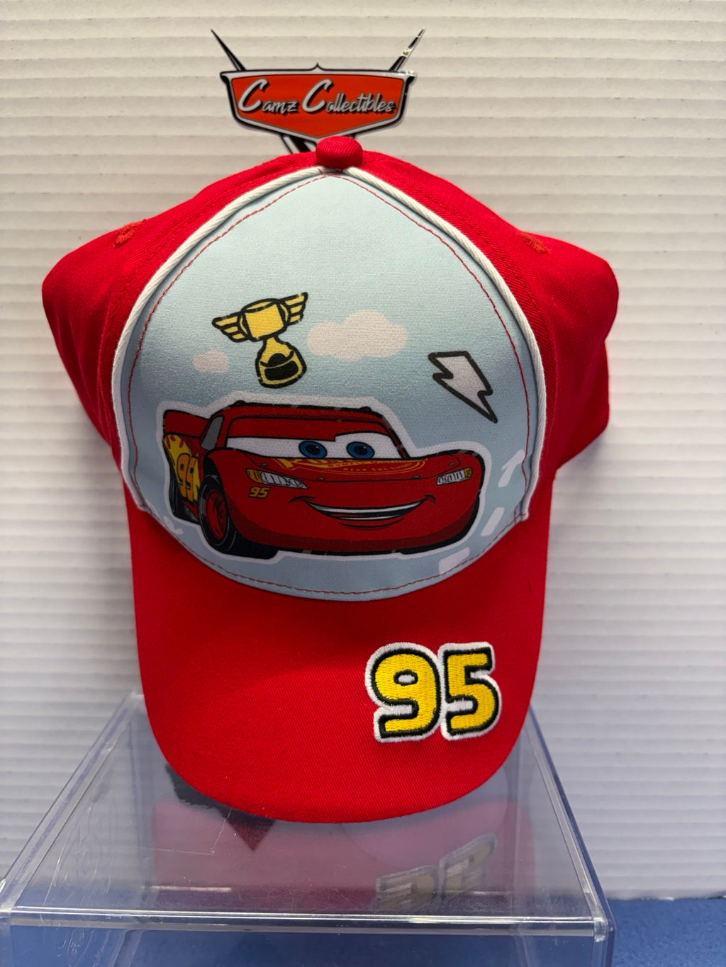Front view of red Lightning McQueen 95 kids cap