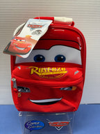 Disney Pixar Cars Lightning McQueen red lunch box front with Rust-eze artwork and 20th anniversary hangtag