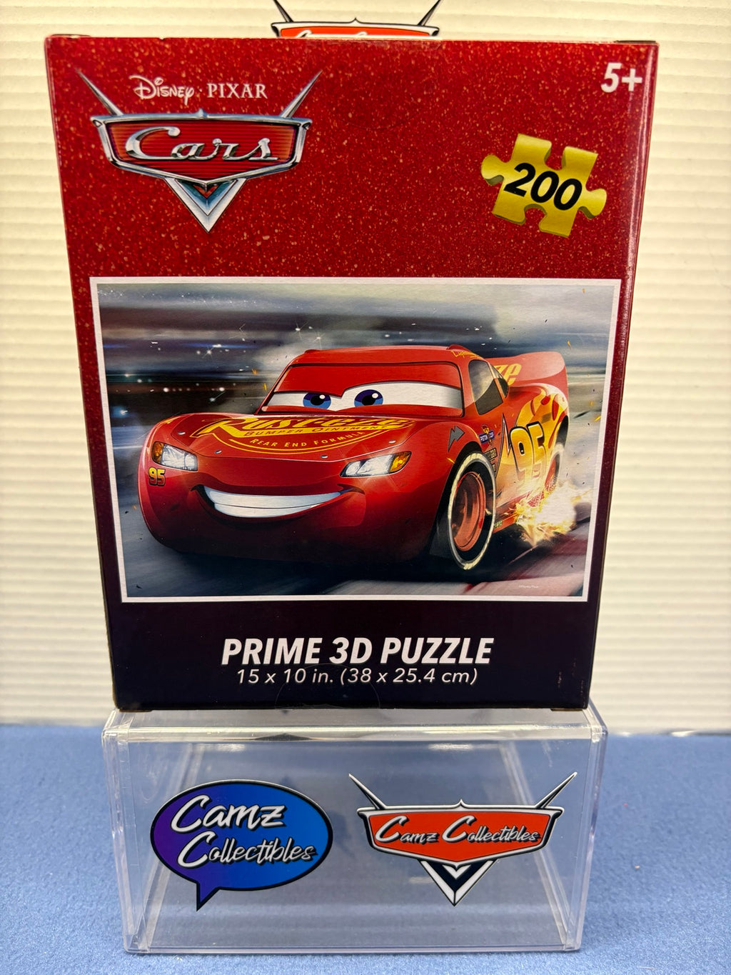 Disney Pixar Cars Lightning McQueen Prime 3D puzzle packaging showing 200 pieces and 15 by 10 inch size