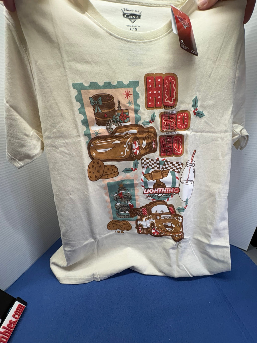 Cream Disney Pixar Cars Christmas PJ shirt featuring Lightning McQueen and Mater with Ho Ho Ho holiday graphics