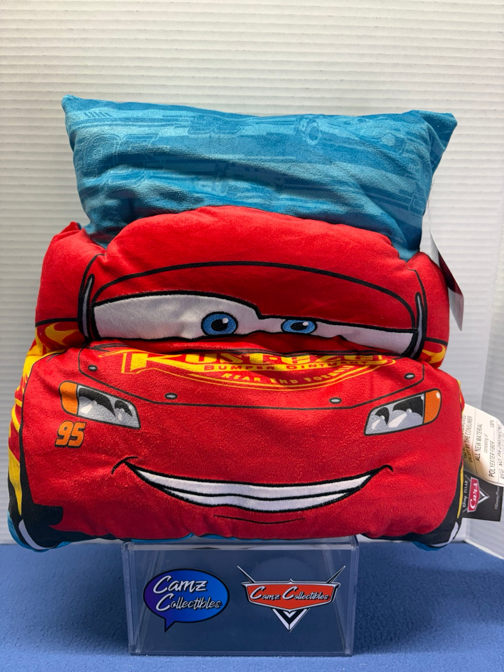 Disney Pixar Cars 12 by 12 inch Lightning McQueen pillow with red character front and blue background