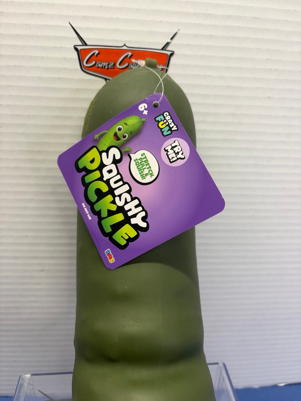 Green 12-inch Crazy Fun Squishy Pickle toy with purple hang tag