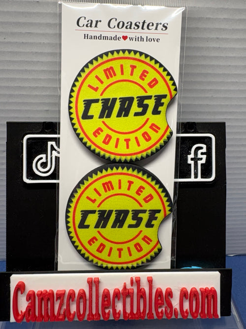 Pair of custom Funko-inspired neoprene car coasters with yellow Limited Chase Edition design and removal notches
