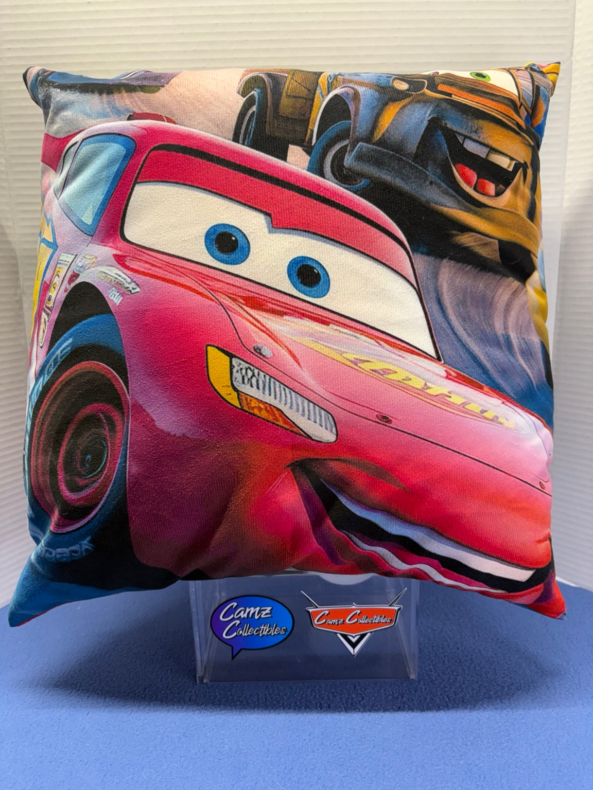 Disney Pixar Cars 16 by 16 inch throw pillow featuring Lightning McQueen and Mater