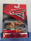 Disney Pixar Cars 3 Mater in damaged red and black card packaging with visible creasing and clear tape