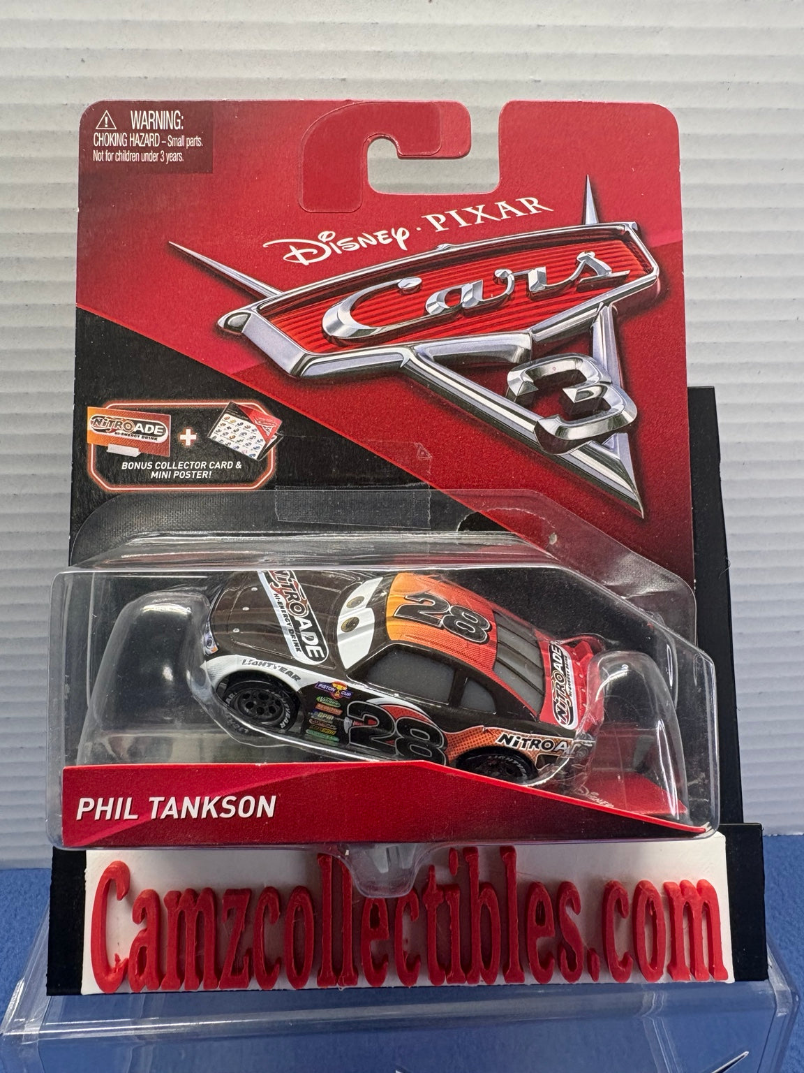 Disney Pixar Cars 3 Phil Tankson Nitroade number 28 on damaged card with bonus collector card and mini poster label