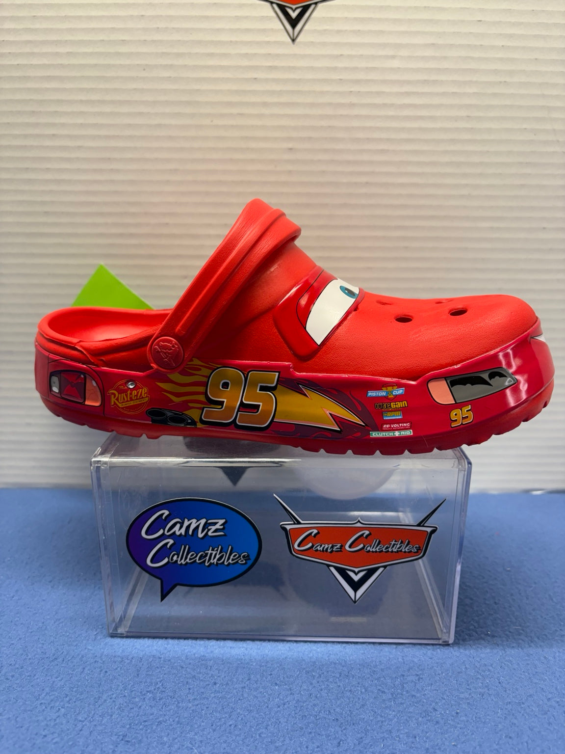 Side of Lightning McQueen Crocs with number 95, lightning bolt and Rust-eze graphics