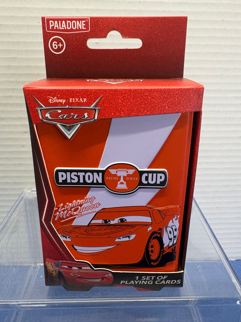 Paladone Disney Pixar Cars playing cards in red Lightning McQueen Piston Cup tin, front packaging