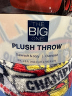 The Big One plush throw label showing oversized 5 by 6 feet dimensions