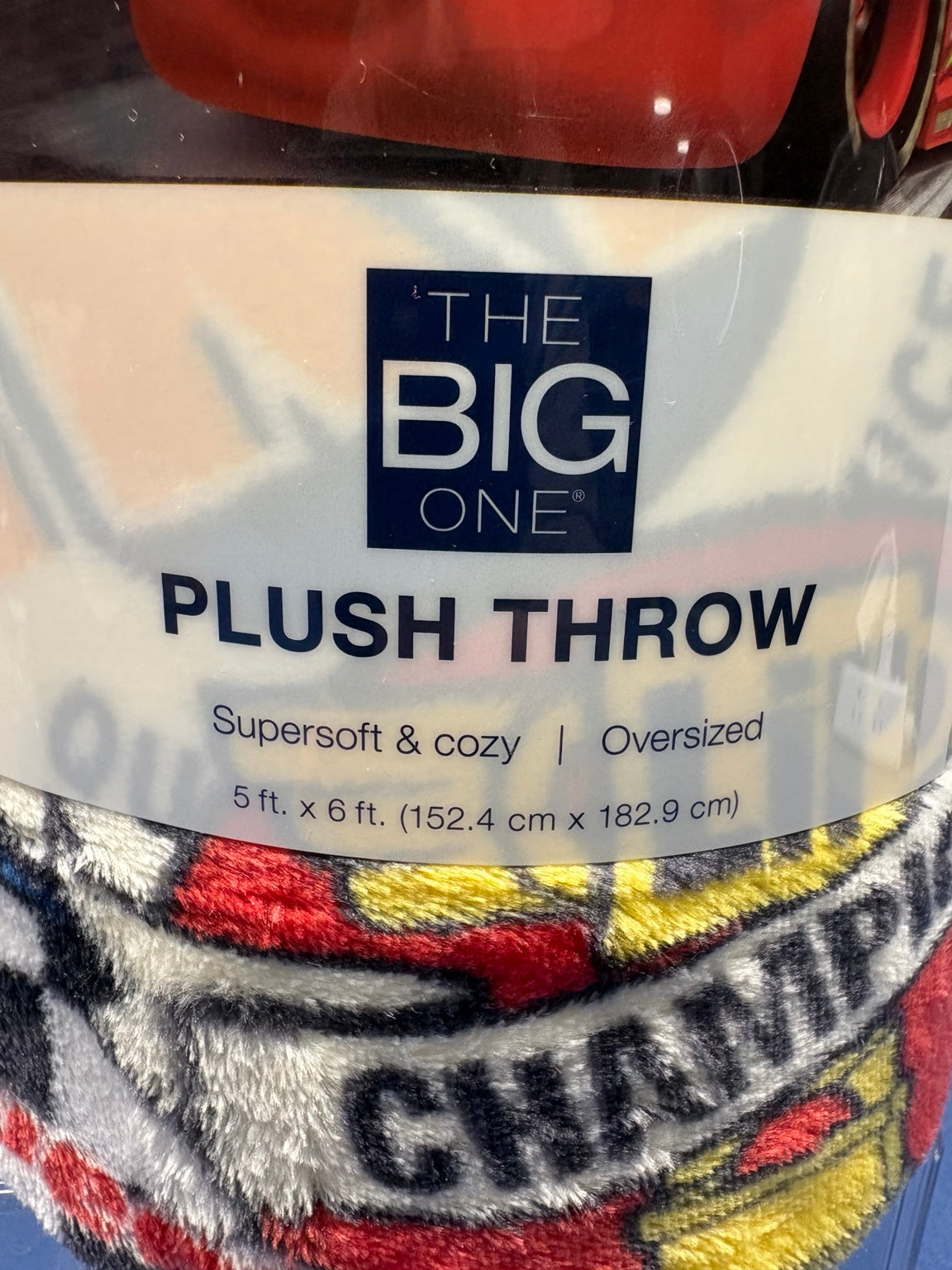 The Big One plush throw label showing oversized 5 by 6 feet dimensions